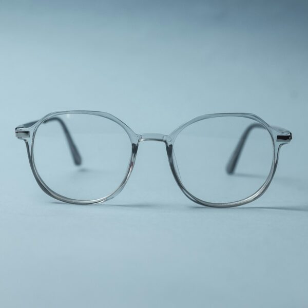 silver framed eyeglasses on white surface